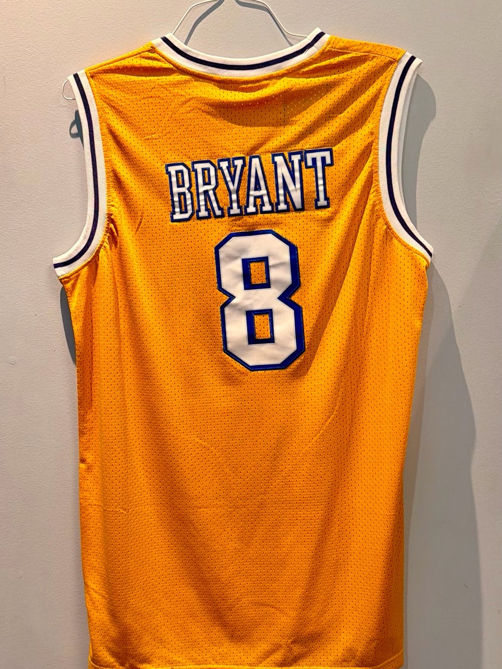 Yellow Basketball Jersey with 'BRYANT' and 8